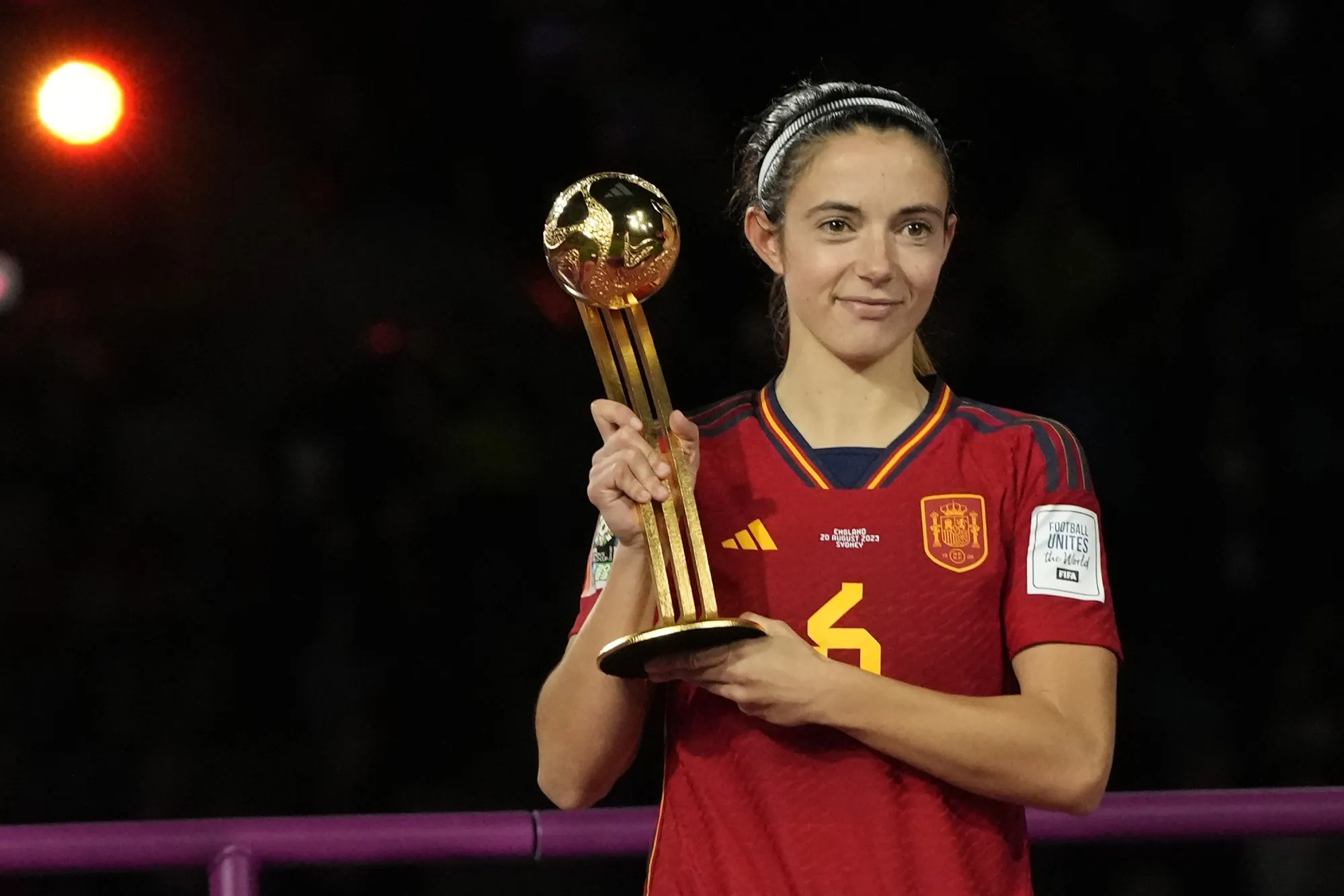 Spain's Aitana Bonmati holds the Player of the Tournament trophy after the final of Women's World Cup soccer between Spain and England at Stadium Australia in Sydney, Australia, Sunday, Aug. 20, 2023. Lionel Messi is the favorite to win a record-extending eighth Ballon d'Or on Monday, Oct. 30. Spain’s Aitana Bonmati is the favorite for the women’s award. (AP Photo/Rick Rycroft, File)