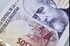 A 100 Argentine peso note is displayed for a photograph in Buenos Aires, Argentina.