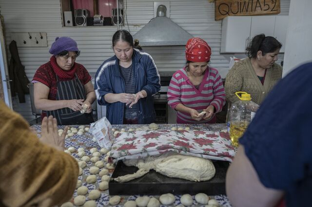 Volunteers make bread and pizza at the Little Corner at the End of The World Foundation soup kitchen in Ushuaia.