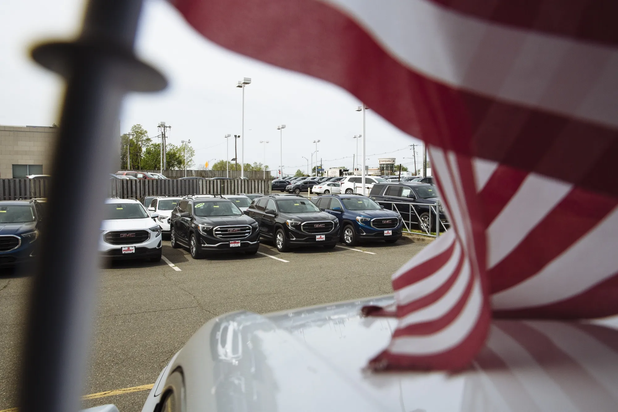 Vehicles are displayed for sale at a General Motors Co. Buick and GMC car dealership.
