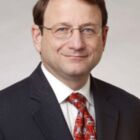 Headshot of Gerald L Storch "Jerry"