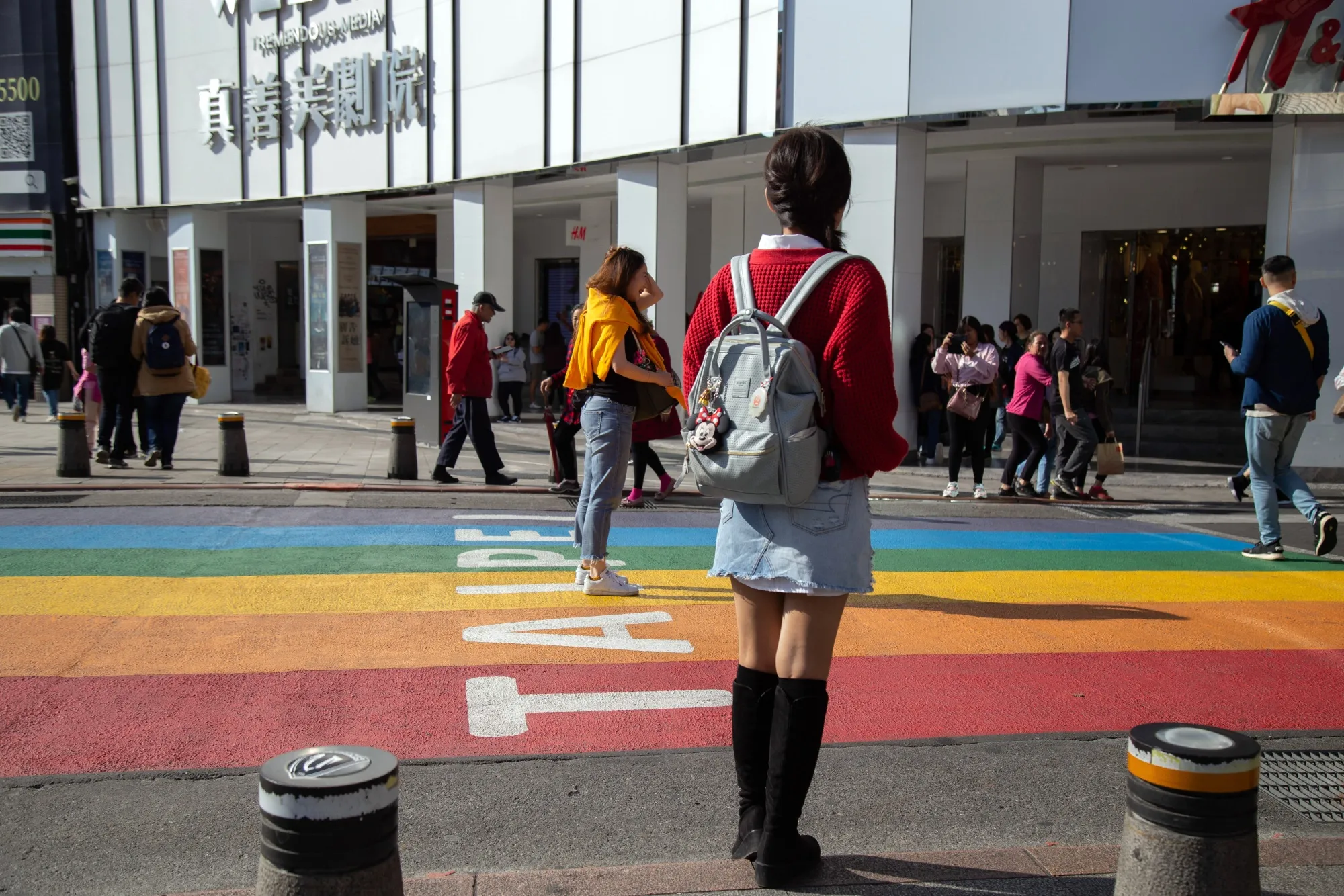 Pedestrians walk past stores in the Ximending district of Taipei, Taiwan, on Jan. 4.