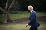 U.S. President Joe Biden walks on the South Lawn of the White House before boarding Marine One in Washington, D.C., U.S., on Friday, Jan. 28, 2022. A major bridge in Pittsburgh has collapsed this morning, hours before Biden is scheduled to visit the city to tout his signature bipartisan infrastructure law.