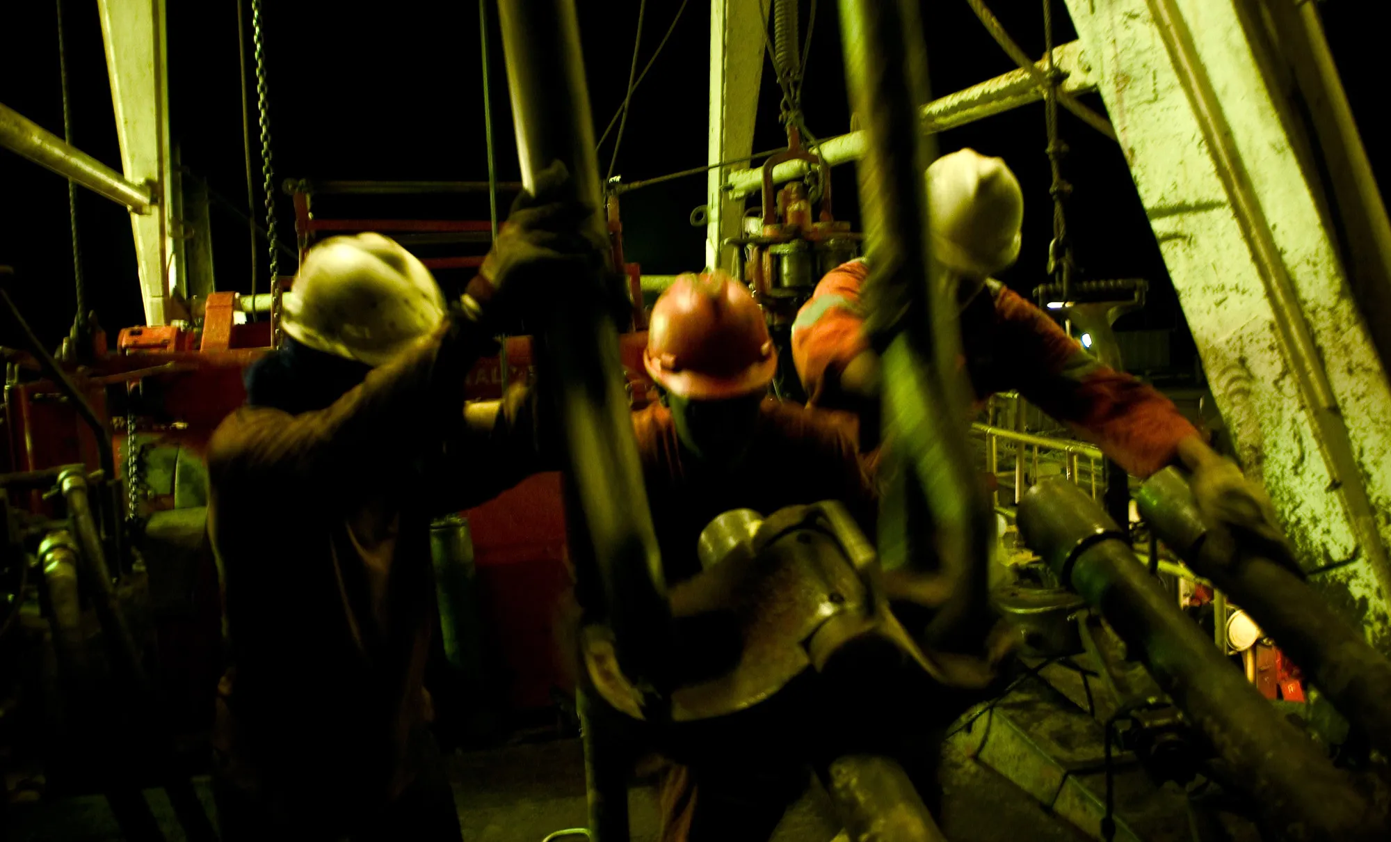 Drillers work thought the night&nbsp;in El-Sharara, Libya in 2004.