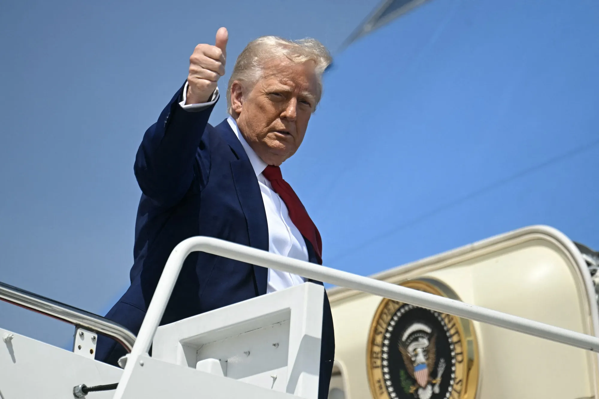 US President Donald Trump boards Air Force One at Joint Base Andrews in Maryland on April 29.