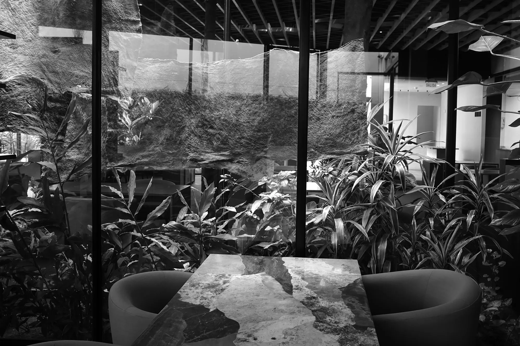 A black and white image of the interior dining room at Central.