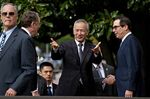 Liu He, China's vice premier, center, gestures while arriving for a meeting with Steven Mnuchin, U.S. Treasury secretary, right, and Robert Lighthizer, U.S. trade representative, second left, at the Office of the U.S. Trade Representative in Washington, D.C., U.S., on Thursday, Oct. 10.