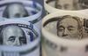 Japanese 10,000 yen, left, and U.S. 100 dollar banknotes