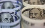 Japanese 10,000 yen, left, and U.S. 100 dollar banknotes