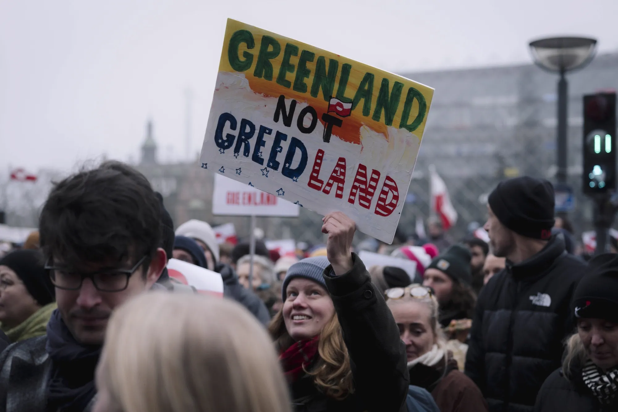 A protester holds a placard during a demonstration in Copenhagen on Saturday. Thousands of people took to the streets across Denmark to protest Donald Trump’s ambitions to take control of Greenland.&nbsp;