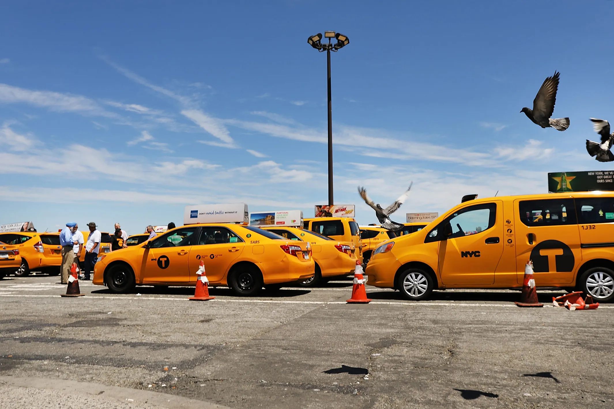 Taxis line up at John F. Kennedy (JFK) Airport while waiting their turn to pick up&nbsp;passengers in 2018.