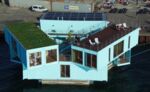 relates to Floating Containers as an Affordable Housing Solution