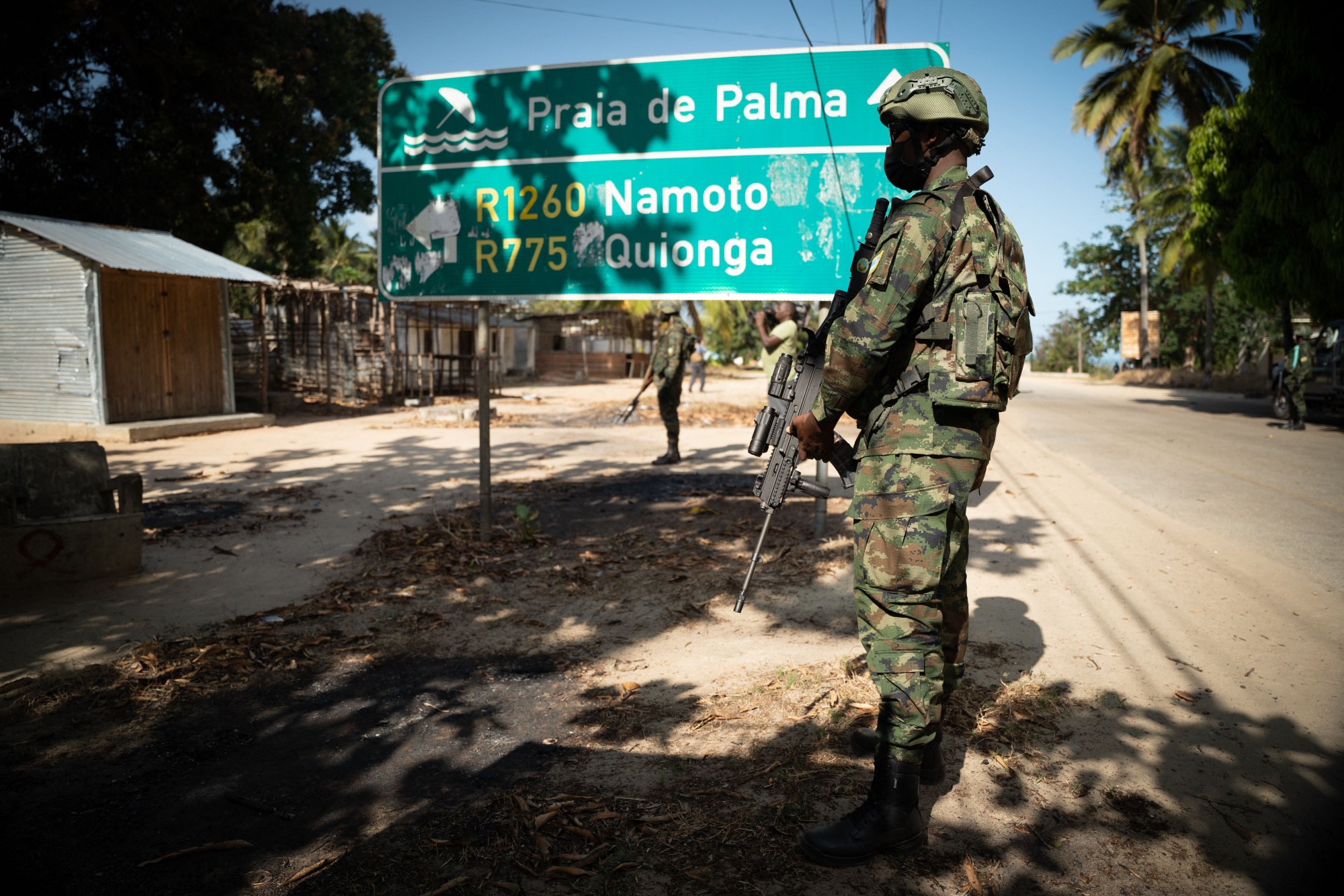 A Rwandan soldier patrols near Palma, Mozambique. Photographer: Simon Wohlfahrt/AFP/Getty Images