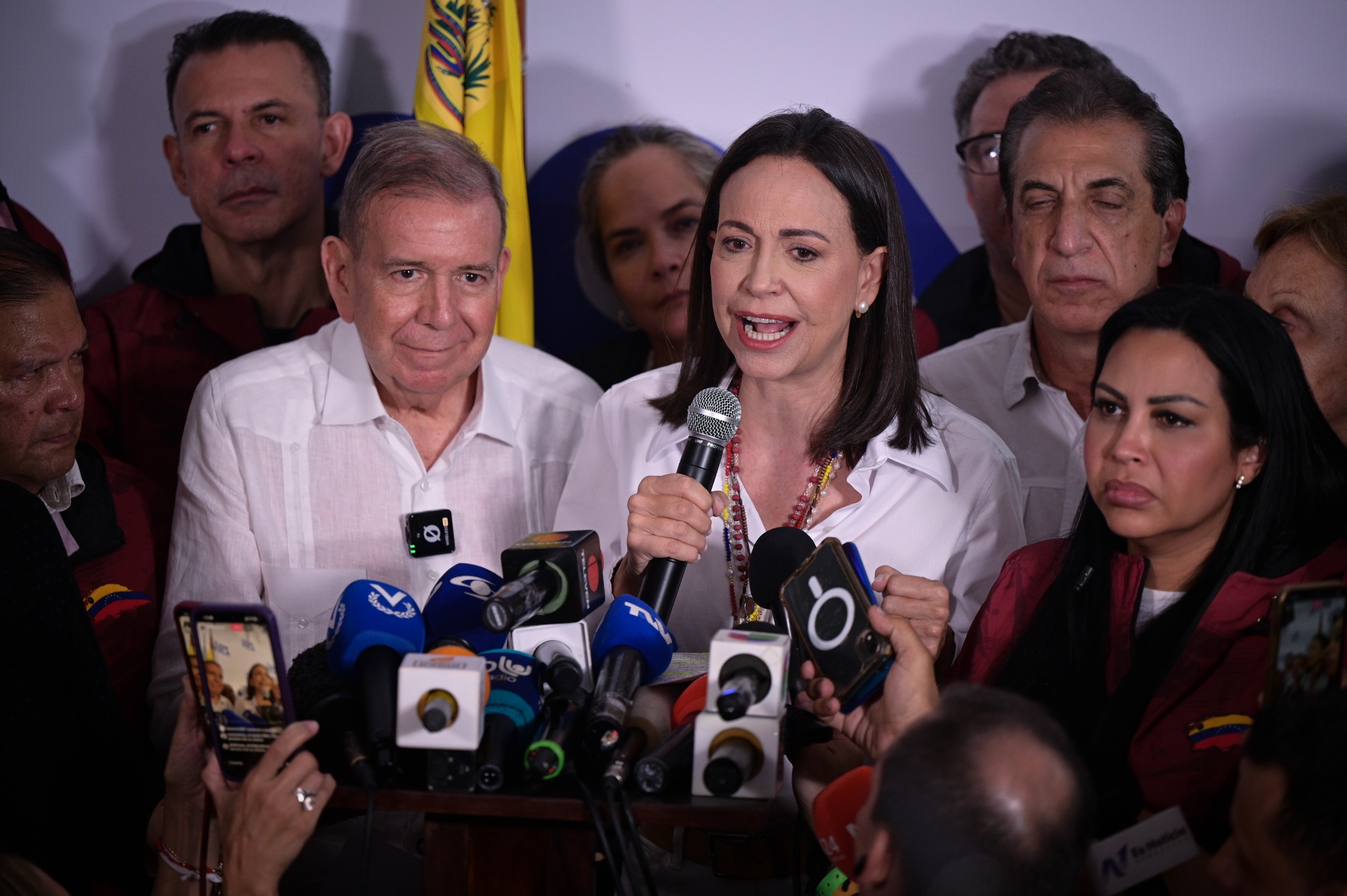 Maria Corina Machado, center right, and Edmundo Gonzalez, center left, hold a news conference following results in the presidential election in Caracas, on July 29.