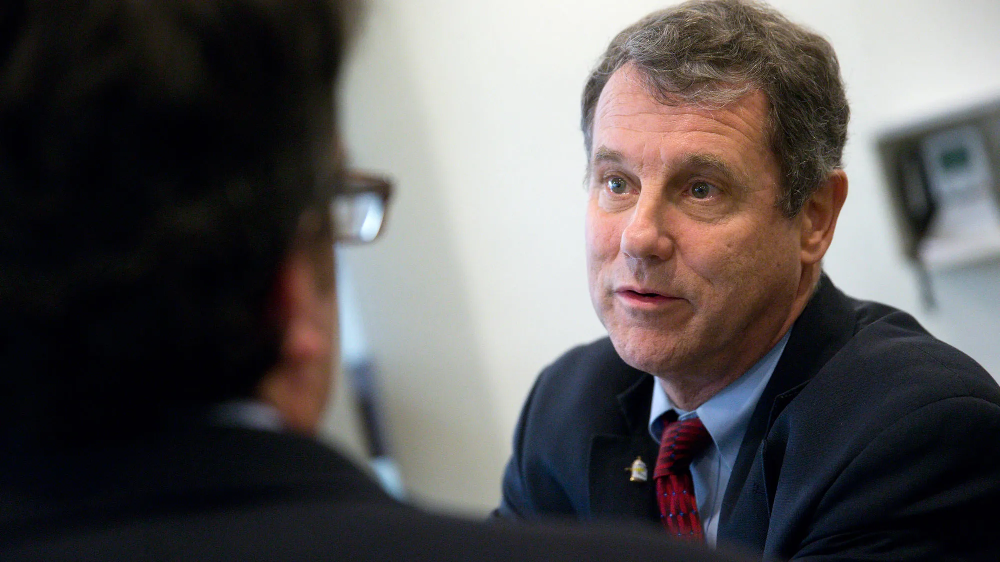 Senator Sherrod Brown, a Democrat from Ohio, talks to a reporter in the U.S. Capitol basement in Washington, D.C., U.S., on Friday, Dec. 12, 2014.
