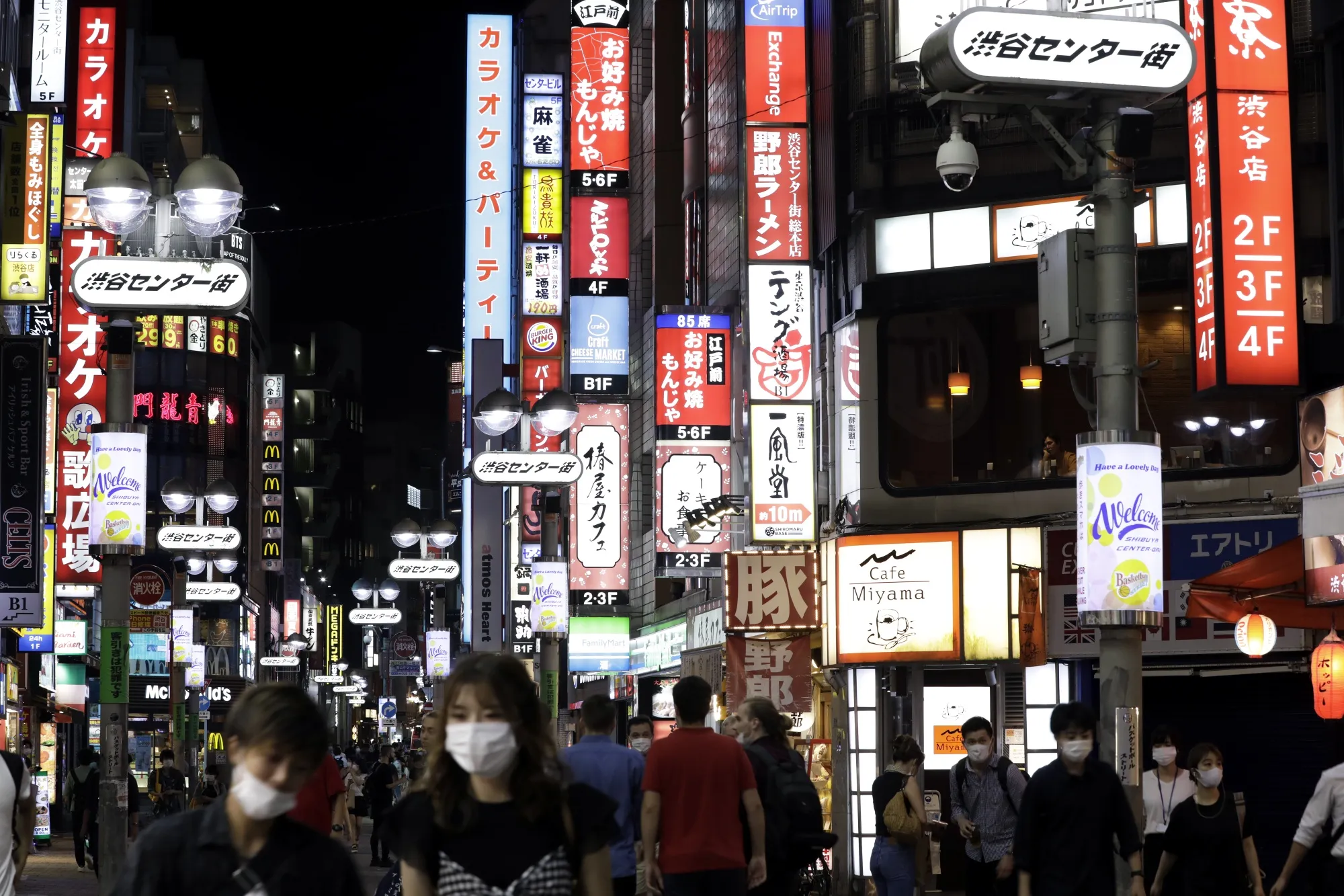 Pedestrians wearing protective masks&nbsp;in the Shibuya district of Tokyo.