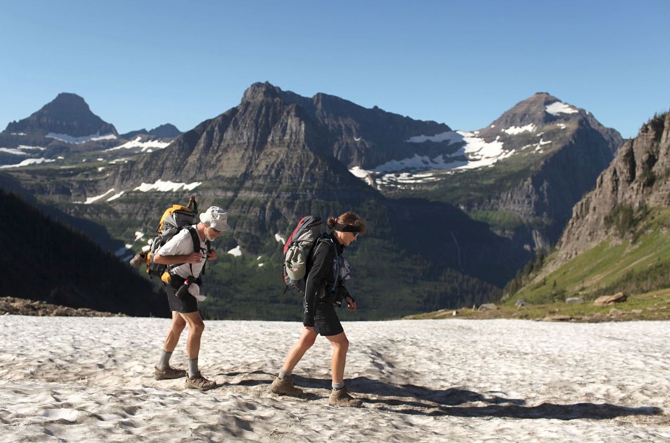 Hikers explore Glacier National Park in Montana, which is predicted to be nearly glacier-free by 2030.