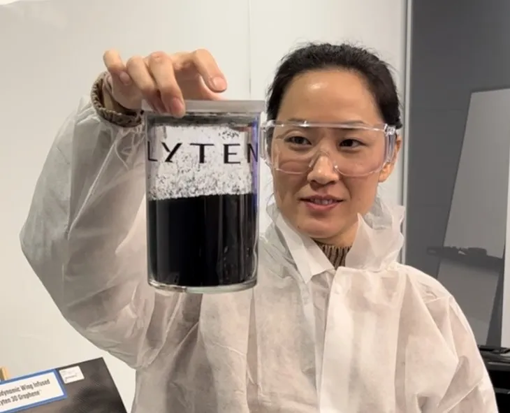 Yayoi Sekine, BloombergNEF’s head of energy storage, holds up a jar of graphene at Lyten’s facility in San Jose, California.