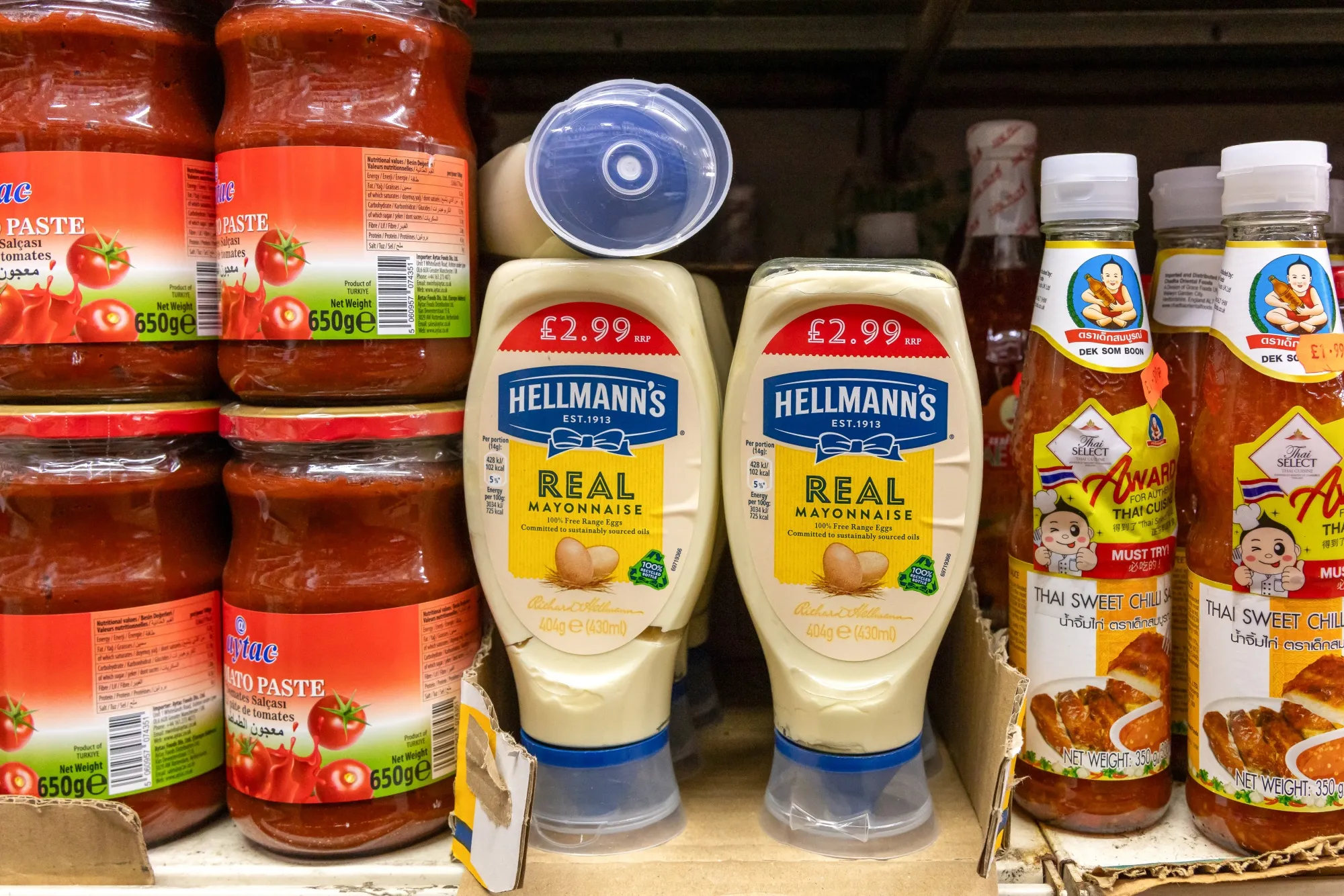 Bottles of Hellmann’s mayonnaise in a supermarket in London, UK. Unilever Plc has agreed to sell its food business to McCormick & Co.