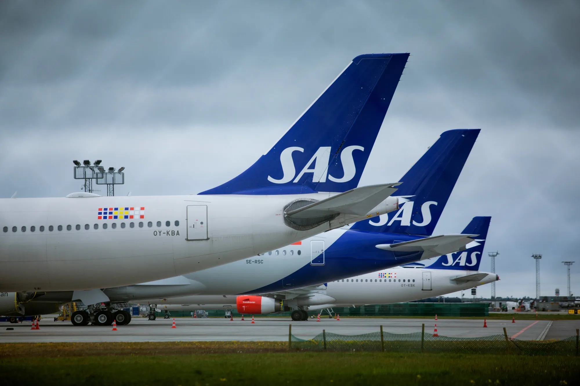SAS AB passenger aircraft on the tarmac at Copenhagen Airport in Copenhagen, Denmark.