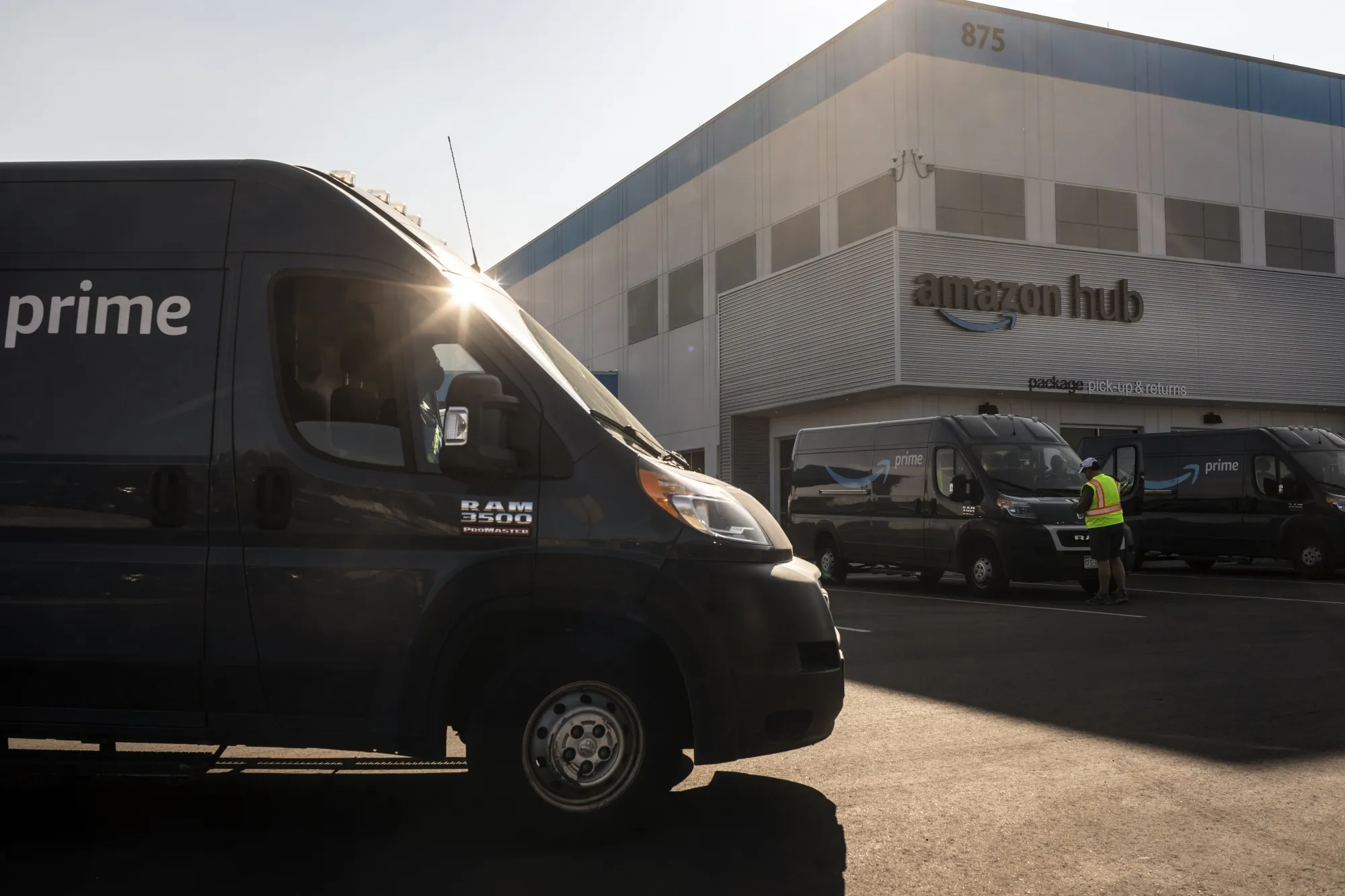 Delivery vans at an Amazon facility&nbsp;in Denver.