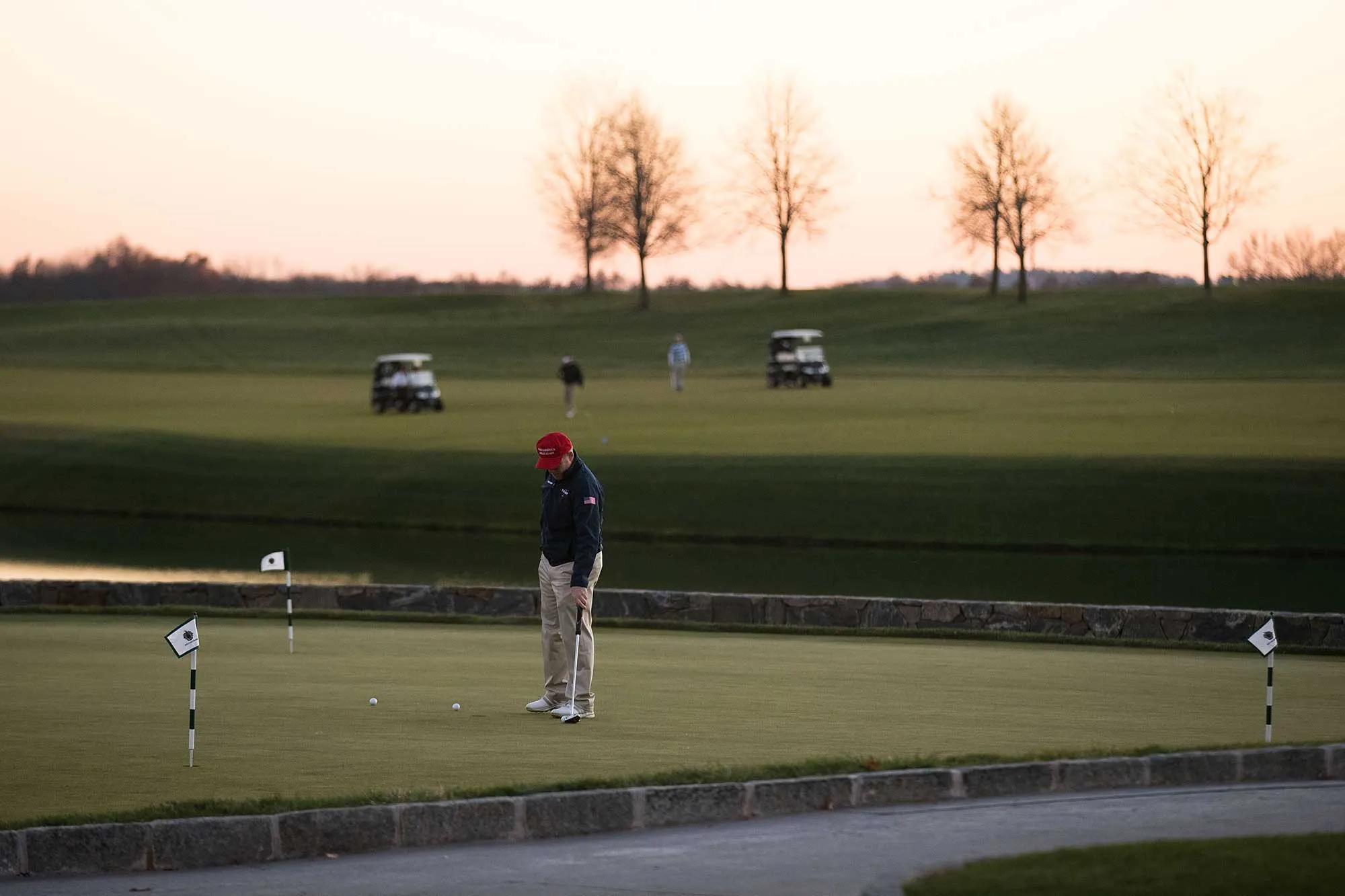 A man practices on the putting green at Trump National Golf Club in Bedminster Township, New Jersey, on Nov. 18, 2016.
