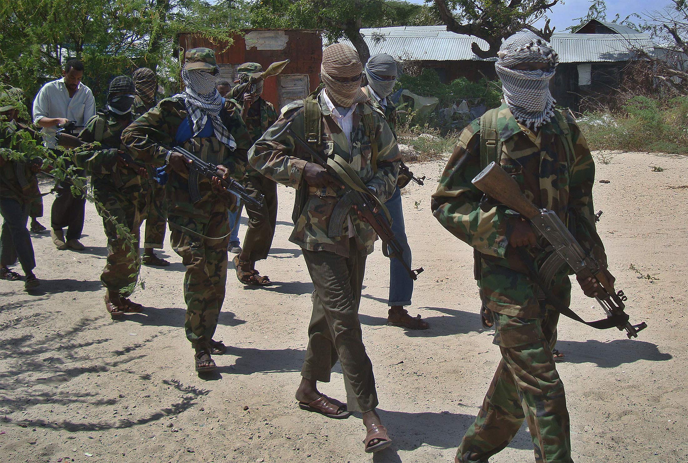 Al-Qaeda linked al-Shabab recruits walk down a street in Mogadishu, Somalia&nbsp;on March 5, 2012.