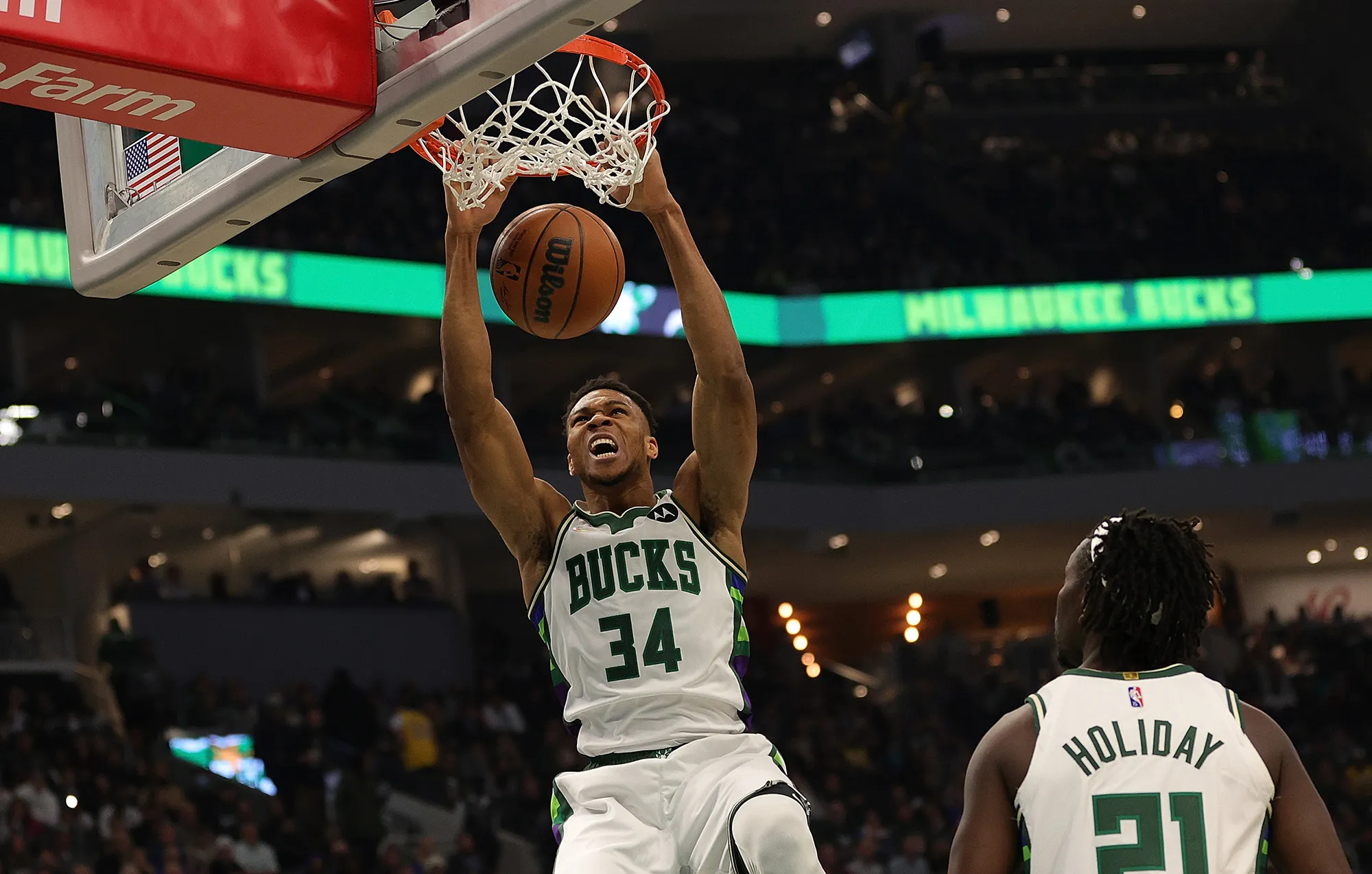 Giannis Antetokounmpo dunks during a game in Milwaukee, Wisconsin.