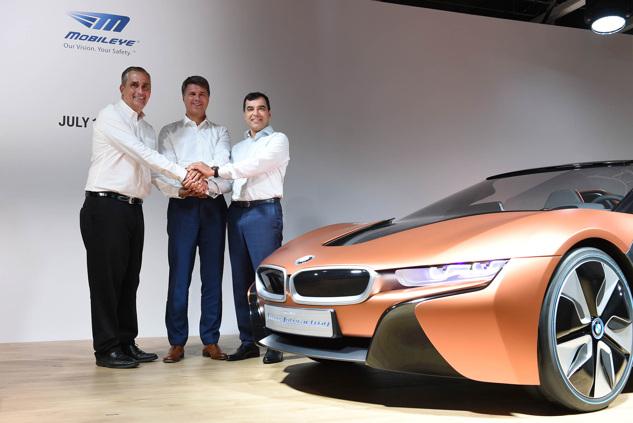 From left, Intel CEO Brian Krzanich, BMW CEO Harald Krueger, and co-founder of Mobileye Amnon Shashua in Munich on July 1. Demand in China for the company’s advanced driver assistance systems, or ADAS, will probably rise about 100-fold three years after the rules are in place.

