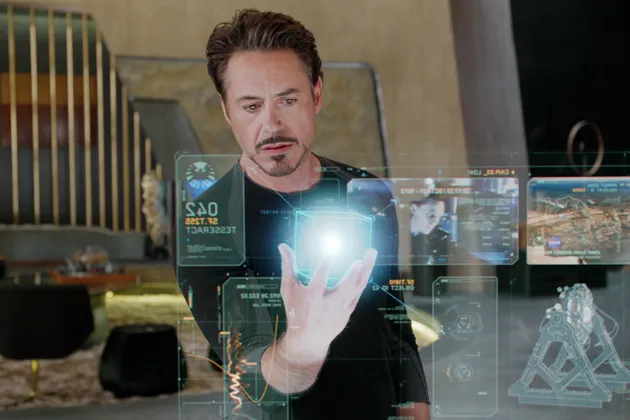 Robert Downey Jr. (as Tony Stark) uses a hologram in the 2012 film "The Avengers"