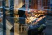 A customer shops for groceries at a supermarket in Vienna.