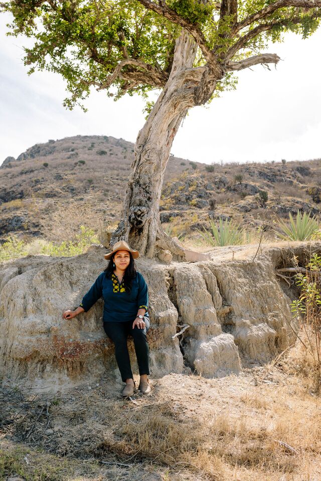 Monica Cortés sitting under a tree
