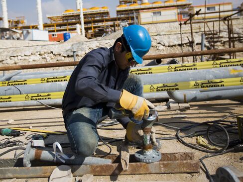 Work continues on the South Pars gas field facility near the southern town of Kangan on the shore of the Persian Gulf in Iran.