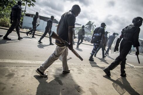Gabonese police forces patrol the streets of Libreville on Sept. 1.