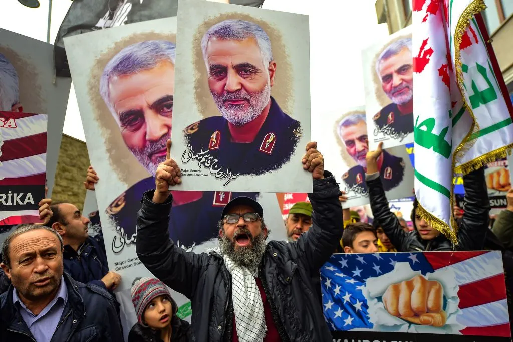 Protesters hold pictures of Iranian commander Qasem Soleimani&nbsp;during a demonstration outside the U.S. consulate in Istanbul&nbsp;on January 5, 2020, two days after top Iranian commander Qasem Soleimani was killed by a U.S. drone strike.