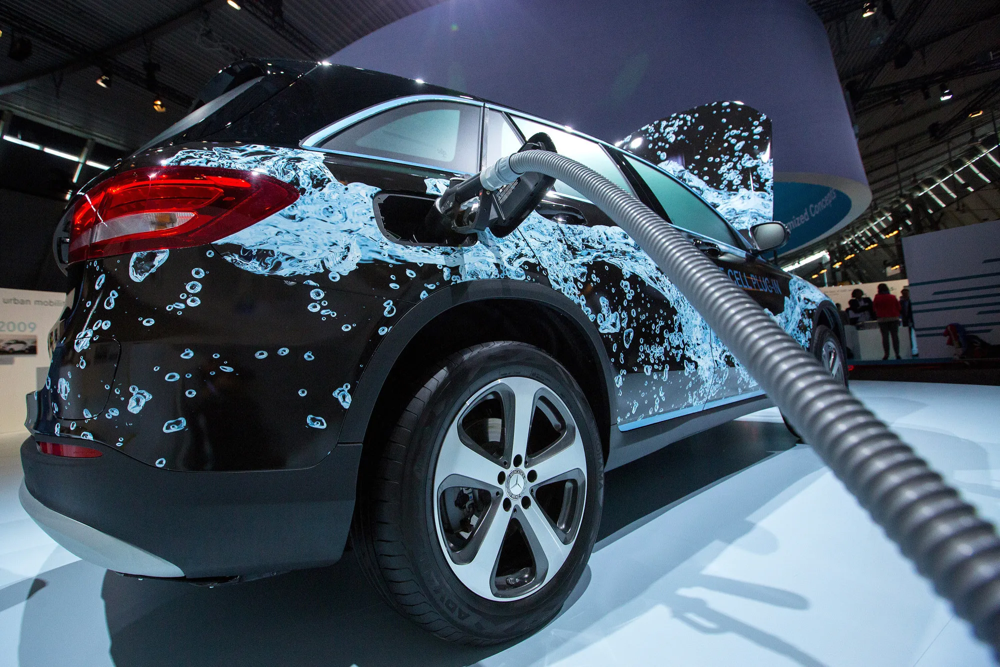 A demonstration hydrogen fuel pump sits connected to a prototype Mercedes-Benz GLC F-Cell hybrid plug-in SUV automobile during Daimler's TecDay Road to the Future event in Stuttgart, Germany, on June 9.

