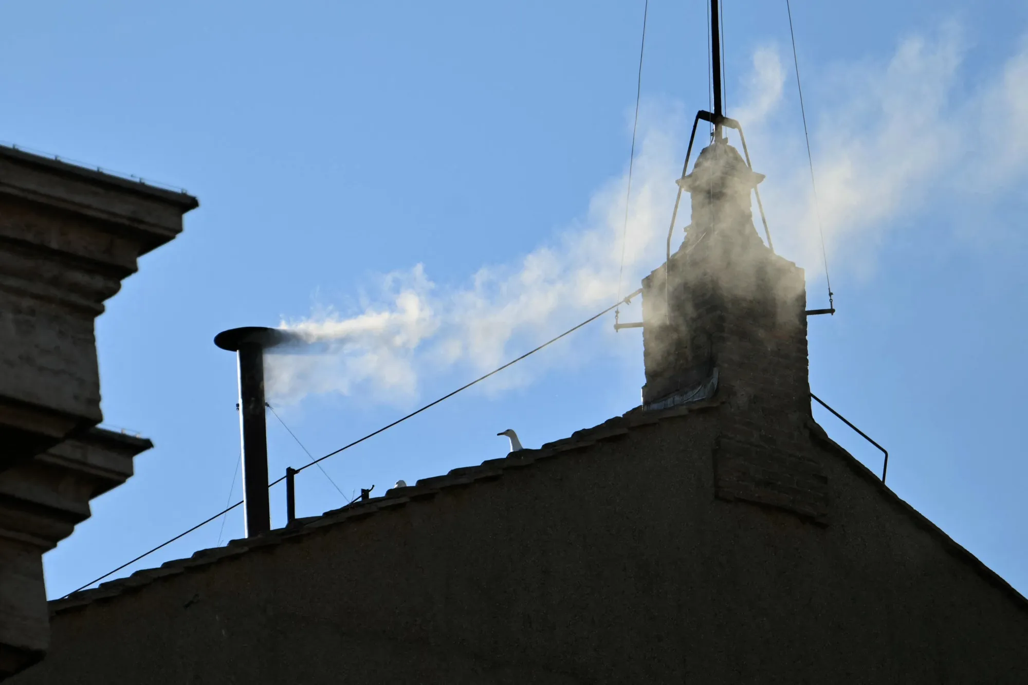 White smoke rises from the chimney of the Sistine Chapel on May 8 signaling a new pope has been elected.