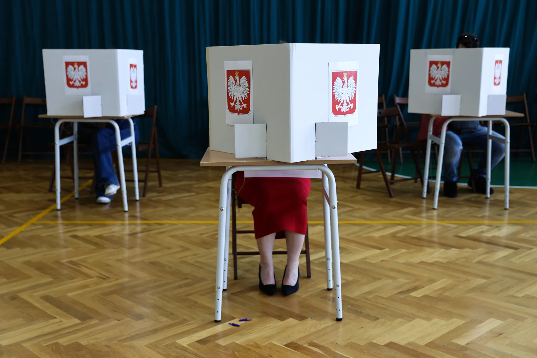 Residents vote during the local elections in Krakow, Poland on April 7, 2024.