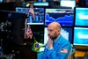 Traders work on the floor of the New York Stock Exchange (NYSE) during the opening Bell on March 4, 2019 in New York City. (Photo by Johannes EISELE / AFP) (Photo credit should read JOHANNES EISELE/AFP/Getty Images)