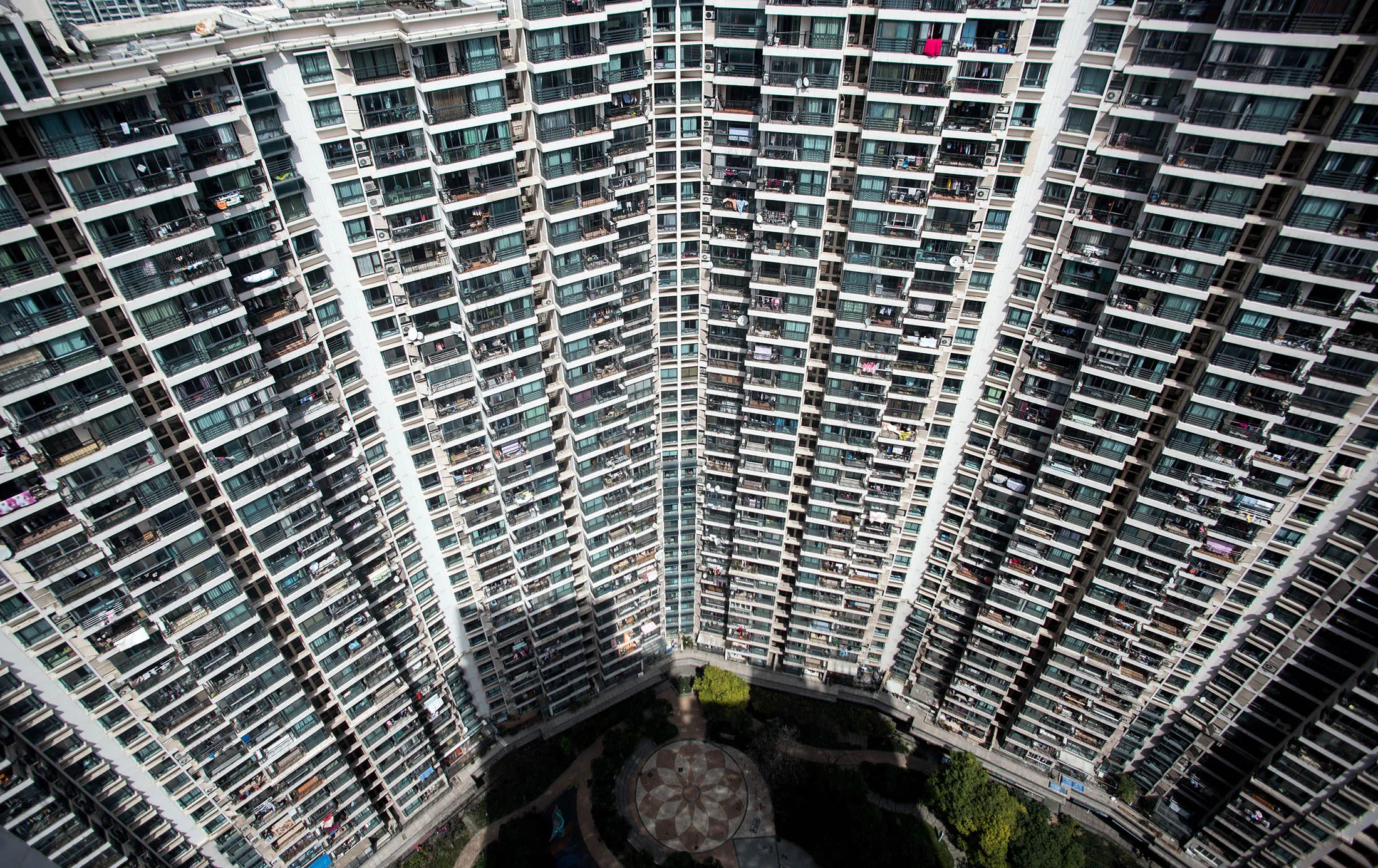 A residential high rise building complex in Shanghai. China’s efforts to clear a home glut are bearing fruit. Investment in real estate development reversed a two-year downward streak in the first two months.
