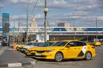 Automobiles operated by Yandex.Taxi service parked&nbsp;in Moscow.