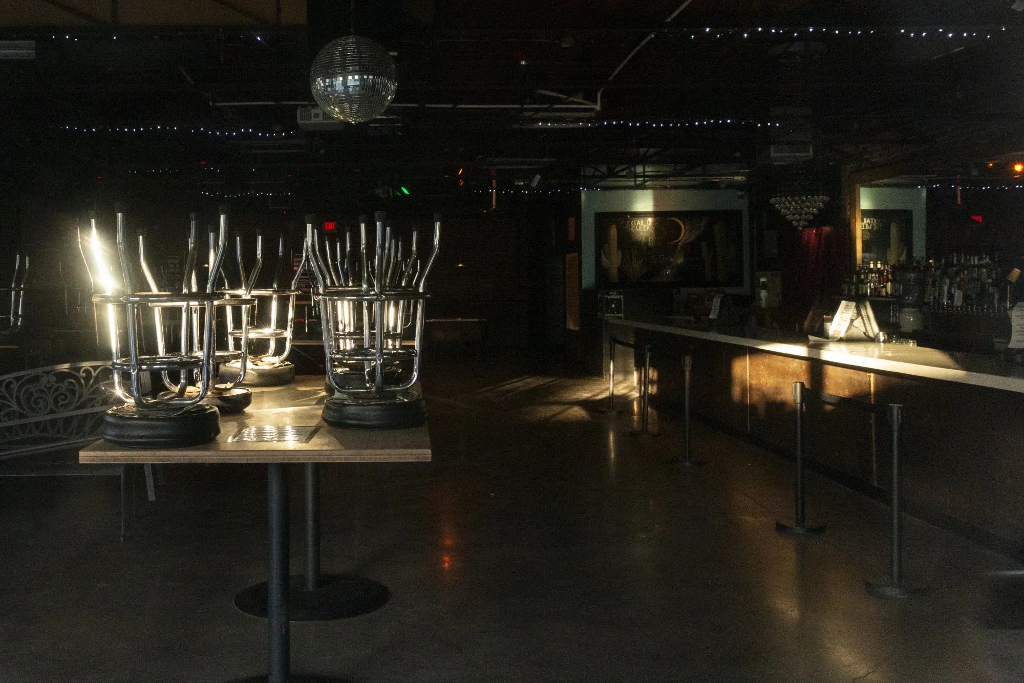 Stools are stored on top of a table at a bar temporarily closed in Tucson, Arizona, on&nbsp;June 30.