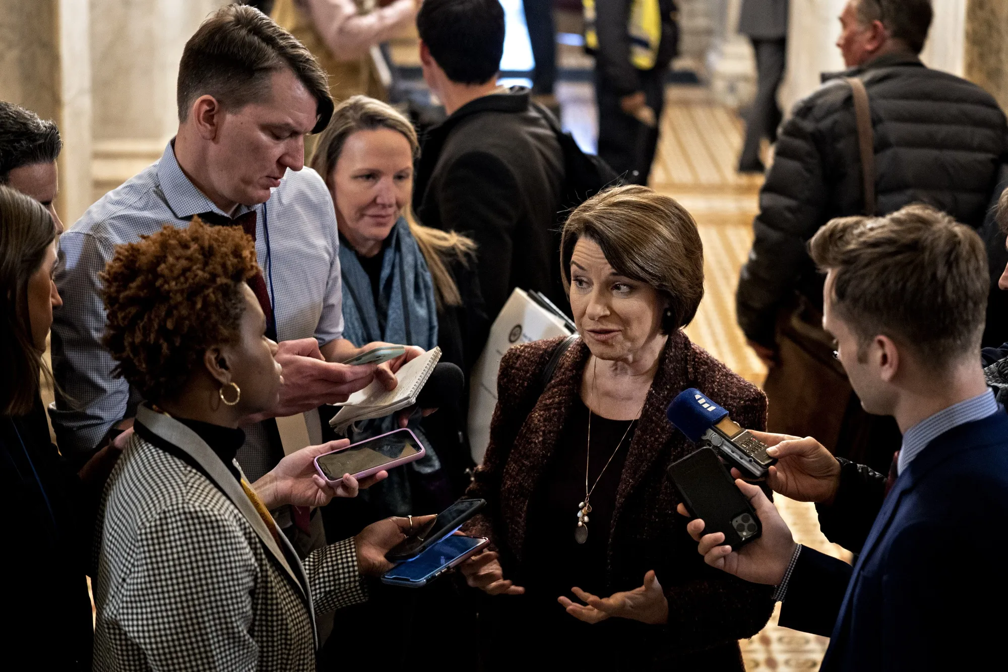 Amy Klobuchar speaks to members of the media in Washington on Jan. 22.