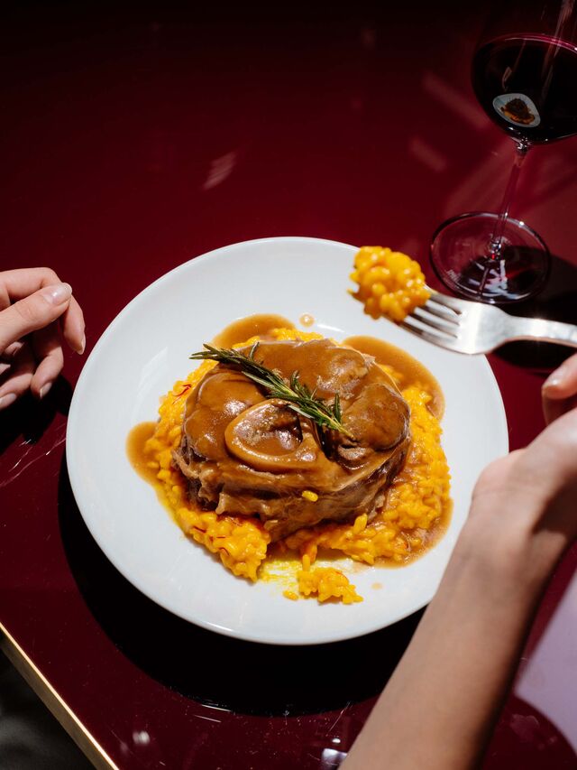 The golden risotto with ossobuco at Trattoria del Ciumbia. 