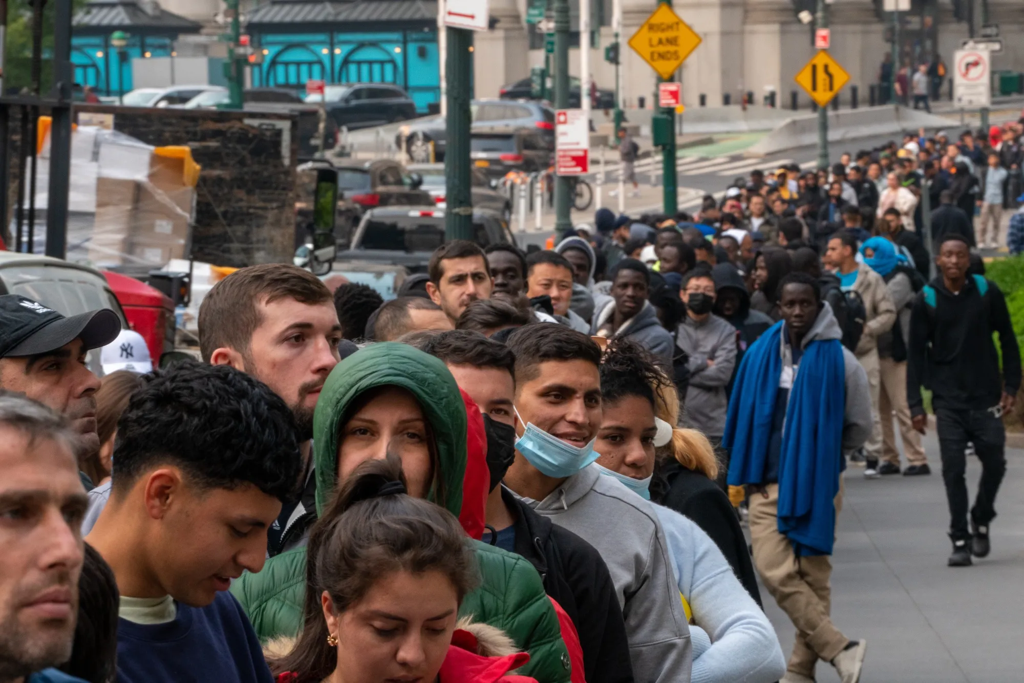 Asylum seekers line up outside of the Jacob K. Javits Federal Building&nbsp;in New York City.&nbsp;