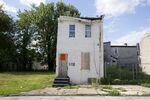 An abandoned house in the distressed Mantua area of Philadelphia moments before its demolition in 2014. 