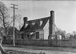 This 1921 image provided by the The Colonial Williamsburg Foundation shows the front elevation of the Dudley Digges House in its original location on Prince George Street, in Williamsburg, Va. The schoolhouse where enslaved and free Black children were taught before the Revolutionary War will be moved from the William & Mary campus to Colonial Williamsburg and restored to its original state, officials announced Friday, Oct. 29, 2021. (Earl Gregg Swem/John D. Rockefeller Jr. Library/The Colonial Williamsburg Foundation via AP)