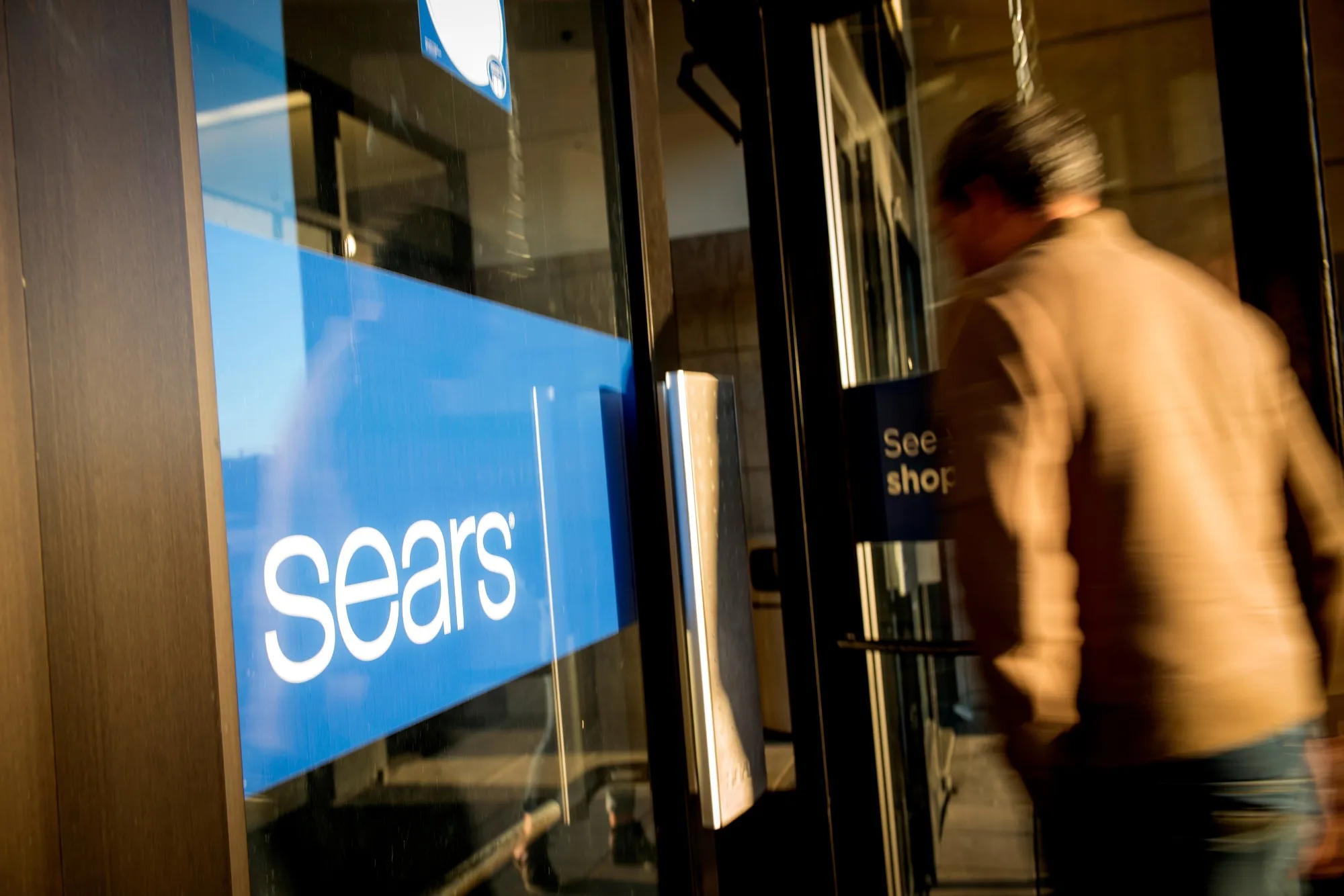 A customer enters a Sears Holdings Corp. store in San Bruno, California.