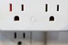 The General Electric Co. logo is displayed on a USB charging station.