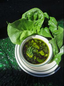 Drawn butter with fresh bayleaf, served with farmers lettuces at Lake Inez.
